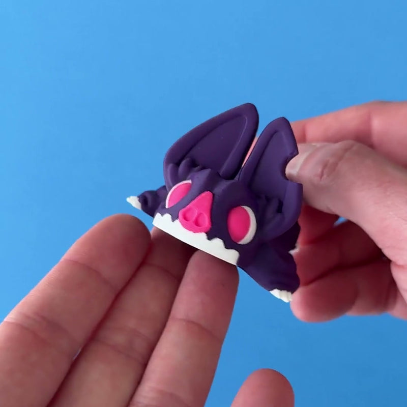 Eko the Bat Chonk Dragon 3D printed fidget wiggling in hand