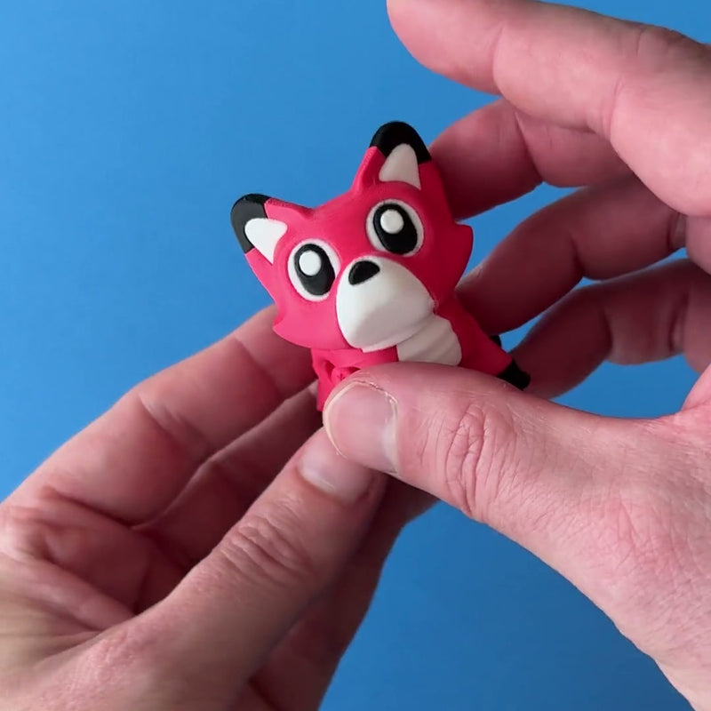 Flick the Fox 3D printed fidget wiggling in hand