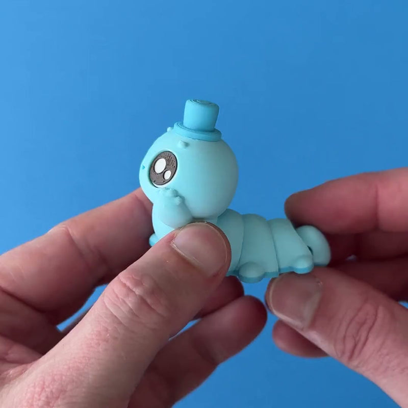 Grubbert Appleby 3D printed fidget wiggling in hand