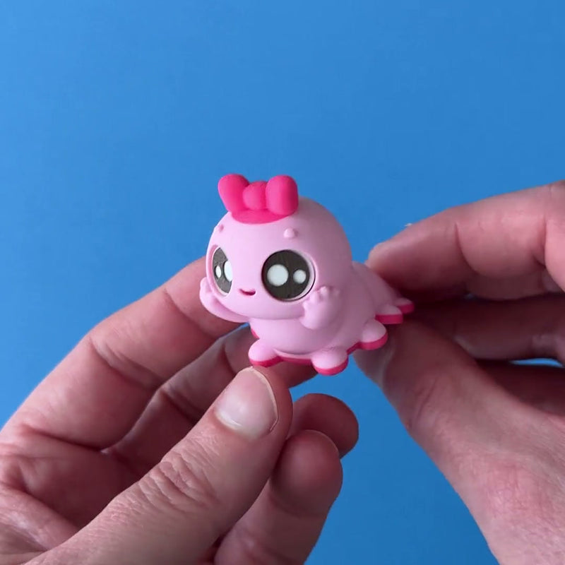 Grubella Appleby 3D printed fidget wiggling in hand