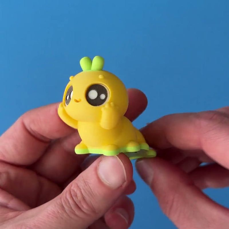 Grublet Appleby 3D printed fidget wiggling in hand