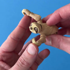 Hugo the Hanging Out Sloth 3D printed fidget wiggling in hand