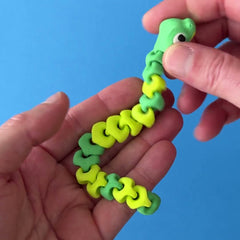 Jade the Snake Hatchling 3D printed fidget wiggling in hand