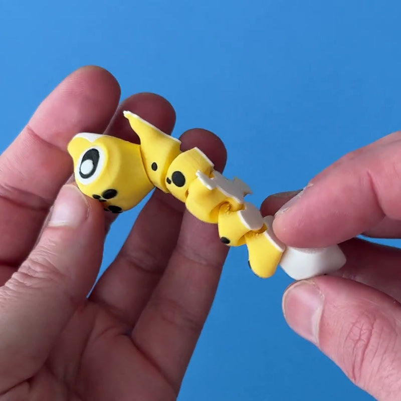 Leo the Leopard Gecko 3D printed fidget wiggling in hand