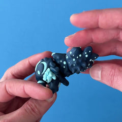 Lurk the Deep Sea Babychonk 3D printed fidget wiggling in hand