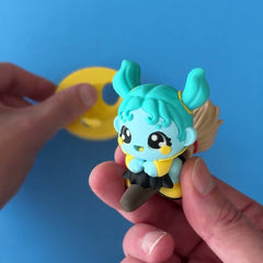 Marina the Wave Witch 3D printed fidget wiggling in hand