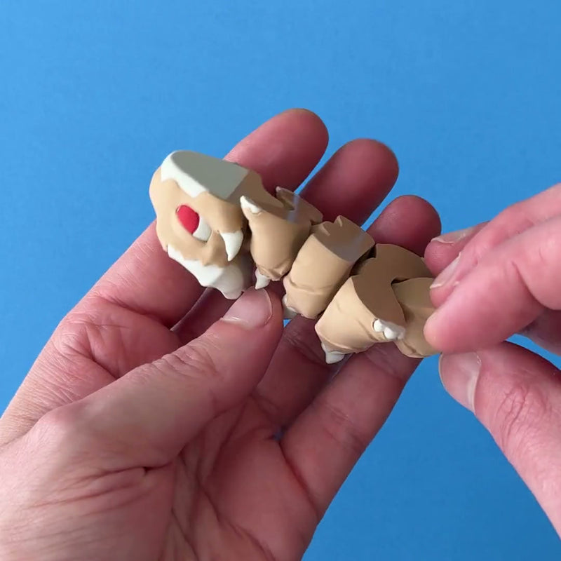 Marrow the Wastelander Dragon 3D printed fidget wiggling in hand