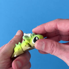 Nemmie the Reef Baby Dragon 3D printed fidget wiggling in hand