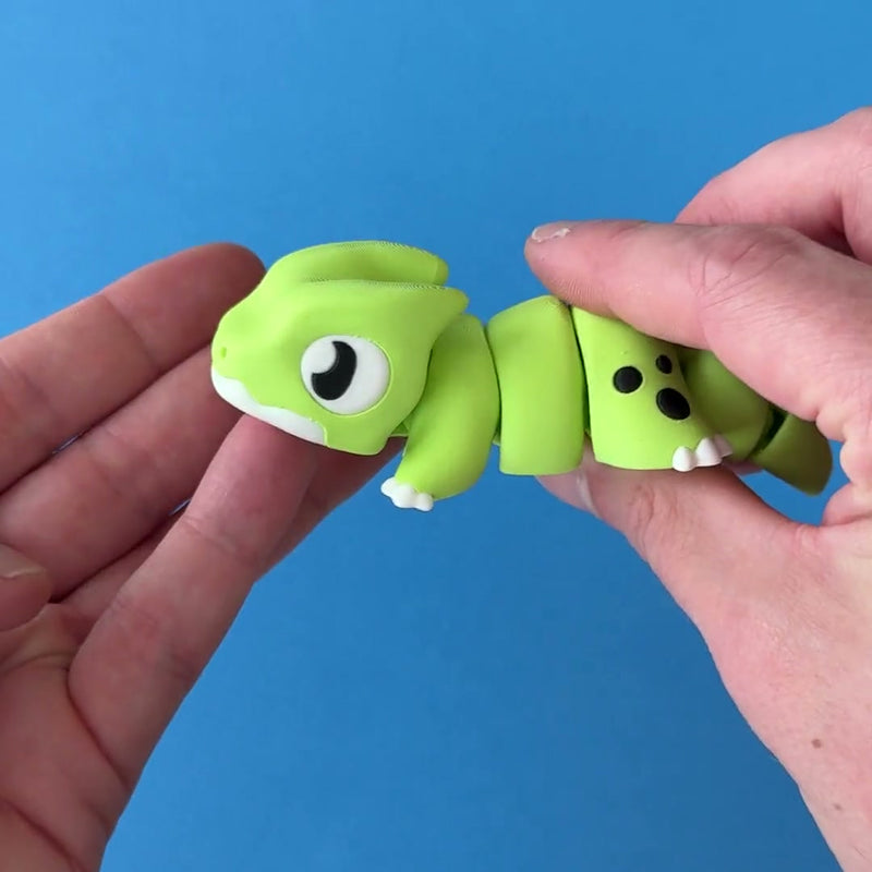Orlo the Dino Beast Dragon 3D printed fidget wiggling in hand