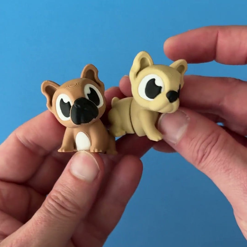 Pierre & Brie the French Bulldogs 3D printed fidget wiggling in hand