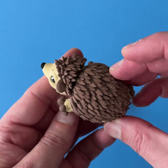 Quillbert the Hedgehog 3D printed fidget wiggling in hand
