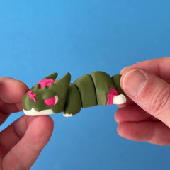 Rotto the Undead Chonk Dragon 3D printed fidget wiggling in hand