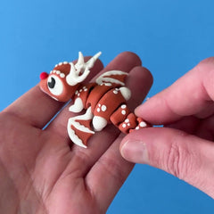 Rudy the Reindeer Dragon 3D printed fidget wiggling in hand