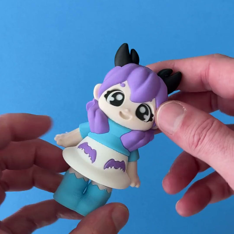 Selene the Scorpio Girl 3D printed fidget wiggling in hand
