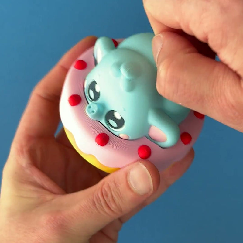 Sprinkle the Cake Stompy 3D printed fidget wiggling in hand