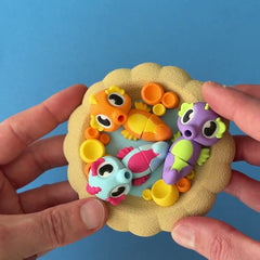 Squiggle the Seahorse 3D printed fidget wiggling in hand