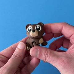 Teddy the Bear Cub 3D printed fidget wiggling in hand