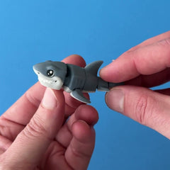 Toothy the Great White Shark 3D printed fidget wiggling in hand