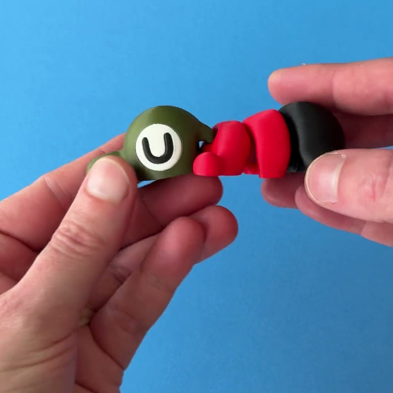 Trek the Hiker Fanchonk 3D printed fidget wiggling in hand
