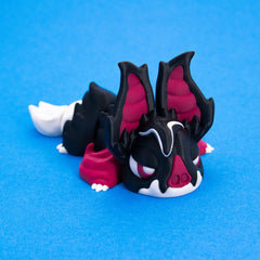 Sipp the Vampire Bat Beastchonk with his white tail behind him, front right view