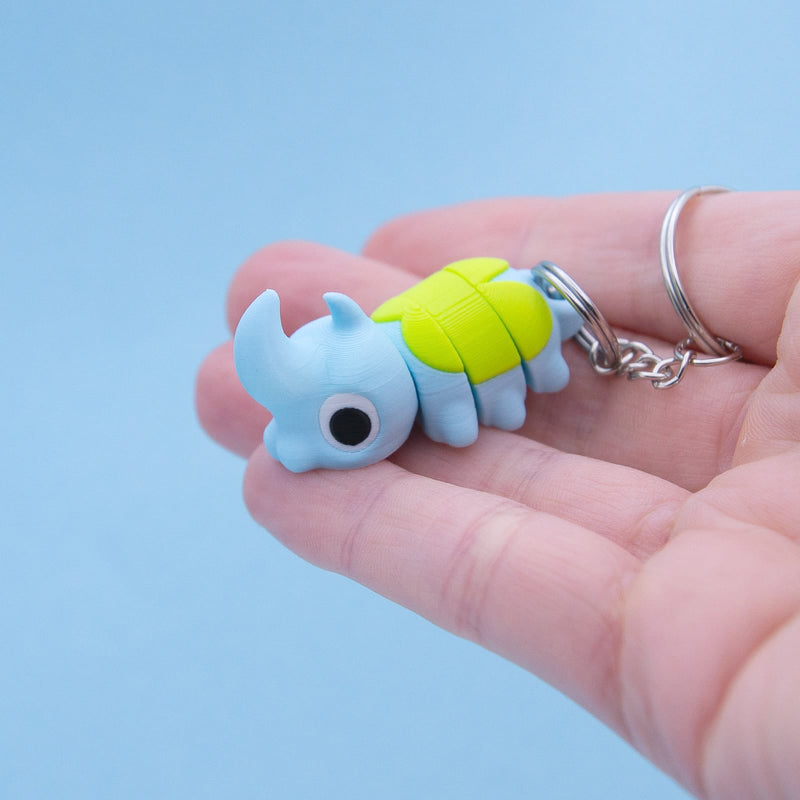 Spike the Horned Beetle keyring – 3D printed articulated bug, blue with green stripes