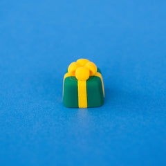 Sprig the green present Christmas keycap, angled view