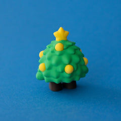 Tannen the Christmas Tree Clicker rear view on a blue background