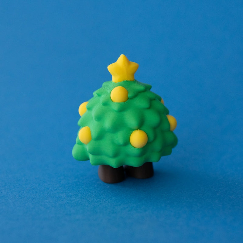Tannen the Christmas Tree Clicker rear view on a blue background