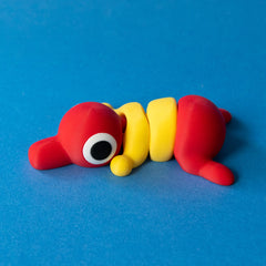 Trek the Hiker Fanchonk in red and yellow, awake, side view