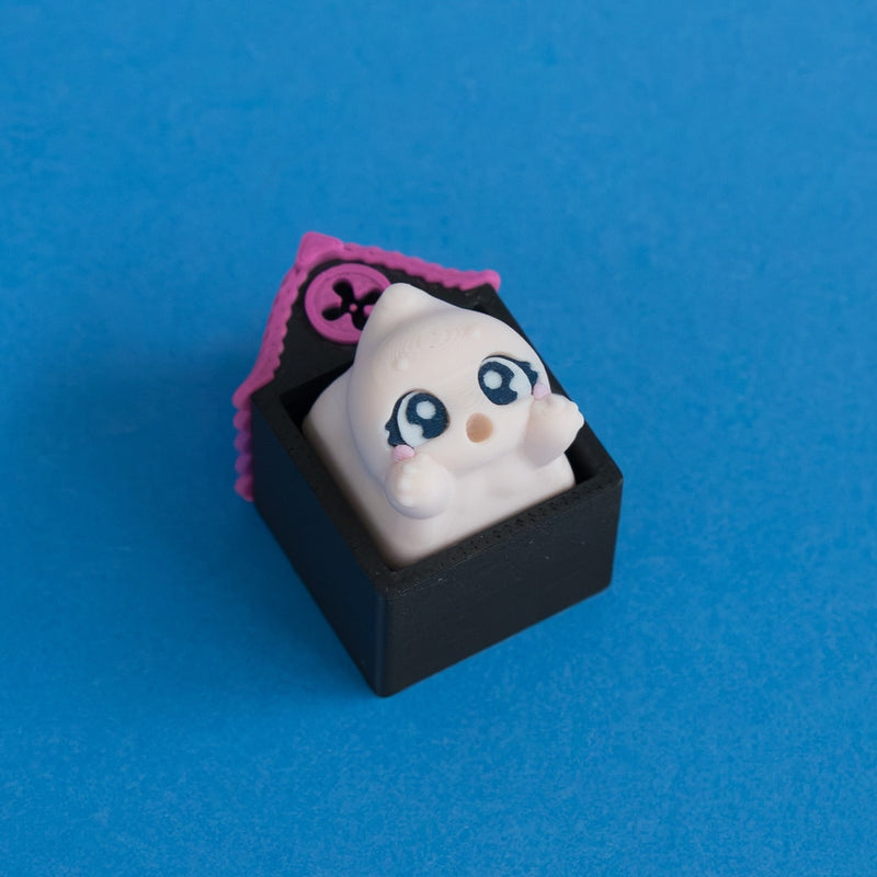 Wispy the beige ghost keycap in Hollow Lane single clicker house.