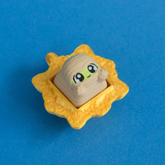 Wrappy the mummy keycap in gold frame clicker.
