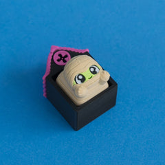 Wrappy the mummy keycap in Hollow Lane single clicker house.