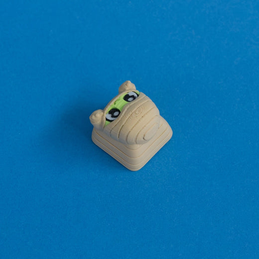 Wrappy the mummy keycap three quarter view.