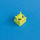 Zibby the bright green alien keycap front view.